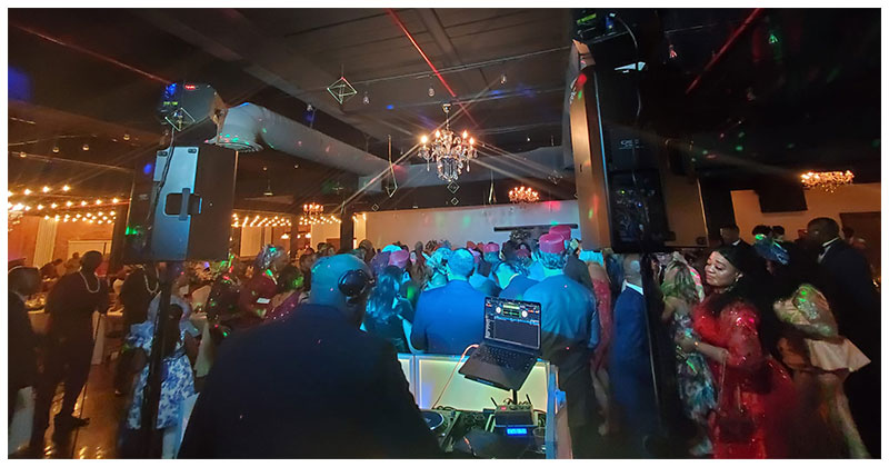 A view of a packed dancefloor from the DJ booth
